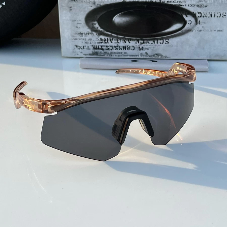 Oakley 4929 Sunglasses – Peach Black Frame | Sporty & Stylish
